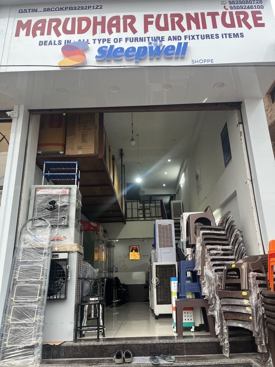 Marudhar Furniture storefront by day with Sleepwell Shoppe sign