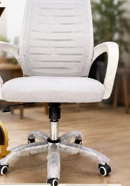 White mesh office chair — new launch