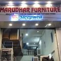 Marudhar Furniture storefront at night